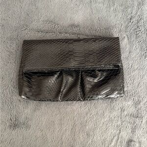 Black faux crocodile skin clutch
